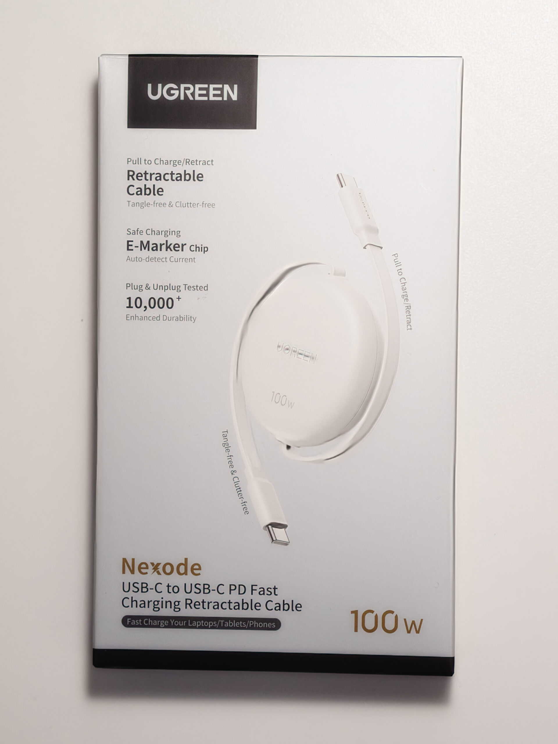 UGREEN Nexode 100W巻き取りUSB-CケーブルのパッケージにE-Markerチップと10,000回以上のテストが記載されている